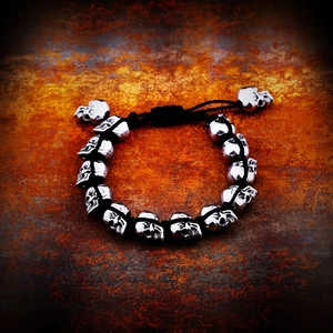 Retro punk skull bracelet with stainless steel beads and adjustable black braided cord