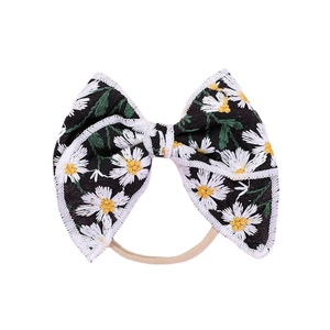 Black cotton headband with embroidered daisy flowers and elastic nylon band for girls