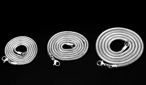 Three sleek silver snake chain necklaces with lobster clasps in different thicknesses