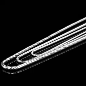 Polished silver snake bone chain necklace made of stainless steel with mirror finish