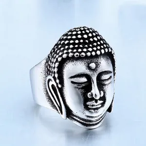 Vintage stainless steel Buddha head ring for men with embossed relief details in antique silver