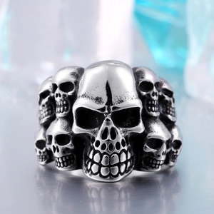 Vintage stainless steel skull ring with punk rock gothic design and distressed silver finish
