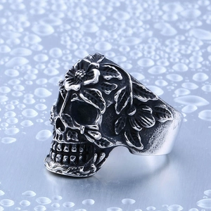 Vintage silver skull and floral ring with gothic punk style for men in oxidized finish