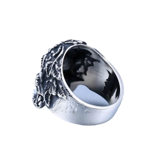Vintage silver skull and rose punk ring for men featuring detailed floral side engravings