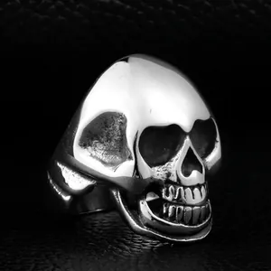 Vintage gothic skull ring for men in polished stainless steel with punk design details