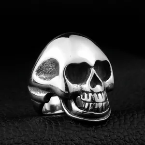 Retro punk style stainless steel skull ring for men with polished vintage silver finish