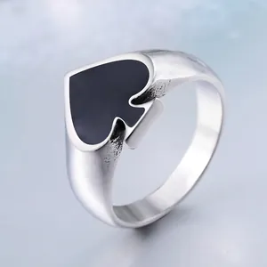Polished silver titanium steel signet ring for men featuring a black spade enamel design