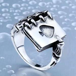 Gothic titanium steel ring featuring dragon claws holding an Ace of Spades poker card