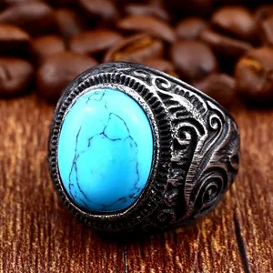 Vintage steel ring for men with oval turquoise stone and engraved scroll pattern detail