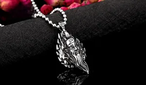 Detailed close-up of retro Guan Yu stainless steel pendant with intricate armor textures