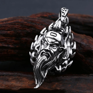 Ethnic Guan Yu pendant in vintage stainless steel with detailed carving and wood background