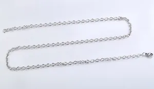 Detailed view of a silver stainless steel O-link chain necklace with a lobster clasp