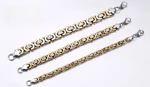 Three widths of two-tone stainless steel U-link chains with gold plating and lobster clasp