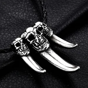 Gothic punk titanium steel skull pendant necklace with sharp fang charms on black leather cord