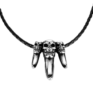 Gothic punk style men's pendant featuring three realistic skulls with a wolf tooth shape