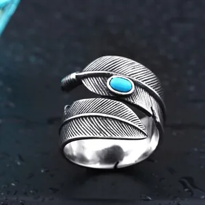 Vintage oxidized titanium steel open ring with double feather design and blue turquoise stone