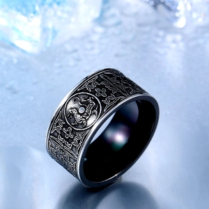 Men's vintage titanium steel ring with black embossed mythical beast totem engraving