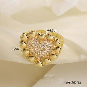 Detailed view of an 18K gold plated heart ring with sparkling cubic zirconia pavé