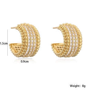 Boucles d'oreilles géométriques dorées en forme de C serties de zircons et perlées