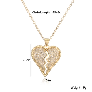 Collier avec pendentif cœur brisé plaqué or, serti de zircons et chaîne ajustable