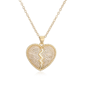 Collier avec pendentif cœur brisé plaqué or et pavé de zircons cubiques brillants
