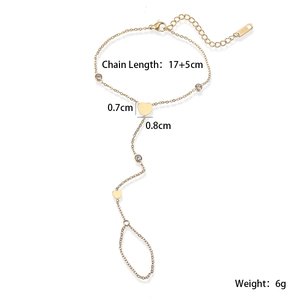 Detail of gold heart slave bracelet with dimensions and stainless steel material info