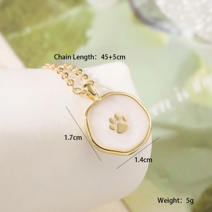 Detail view of 18K gold plated necklace showing dimensions 45+5cm and paw print charm