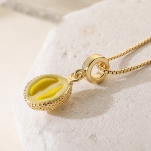 Chic 18K gold plated durian pulp pendant necklace with yellow enamel on a gold box chain