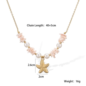 Detail view of ocean-style necklace with starfish pendant, shell fragments and pearl beads