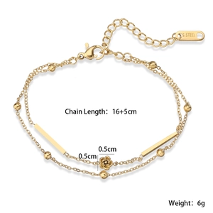 Detail of rose tassel necklace with S.STEEL engraving on double-layered gold chain
