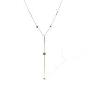 Elegant gold Y-shaped stainless steel necklace featuring hollow rose pendants and tassels