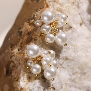 Elegant gold stainless steel drop earrings with white pearl grape cluster design