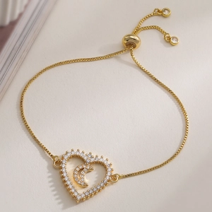 Bracelet élégant plaqué or 18 carats avec cœur et croissant de lune sertis de zircons