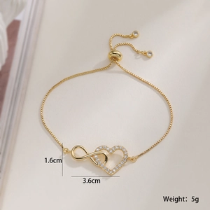 Elegant gold heart and infinity symbol bracelet with sparkling zircon stones