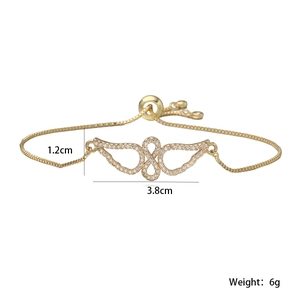 Close-up of 18K gold plated infinity wing bracelet with white zircon and dimensions