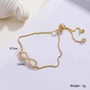 Detail of 18K gold-plated infinity bracelet with pavé cubic zirconia and adjustable chain
