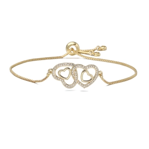 Luxurious interlocking heart bracelet with white zircon stones on adjustable gold chain