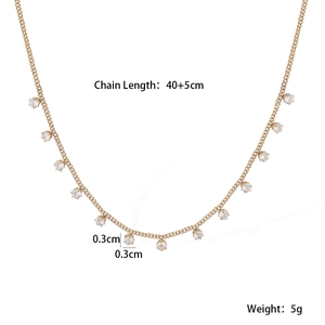 Macro detail of gold plated stainless steel chain showing 0.3cm zircon pendant dimensions