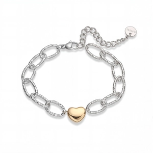 Detail of hammer-textured steel chain with golden heart pendant and S.STEEL tag
