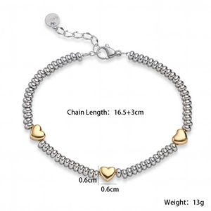 Detail of beaded stainless steel heart bracelet showing s.steel tag and dimensions