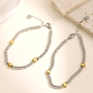 Beaded stainless steel heart and star pendant bracelet set with gold accents