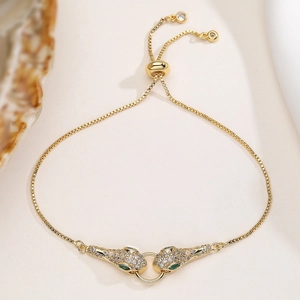 Bracciale a forma di serpente placcato oro 18K con zirconi e catena a scatola regolabile