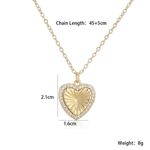 Detalle del collar con colgante de corazón de oro de 18K con dimensiones e incrustaciones