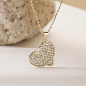 Gold plated heart pendant necklace with pavé cubic zirconia on a classic box chain