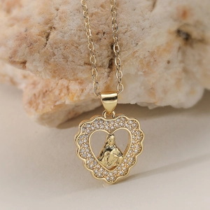 18K gold plated heart necklace with Zirconia stones and Virgin Mary pendant detail