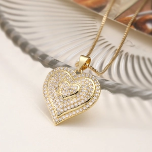 Luxurious gold-plated double heart pendant necklace with shimmering zircon stones