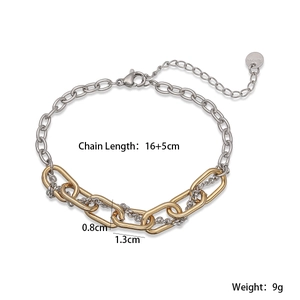 Detail of 18K gold and silver two-tone stainless steel chain link bracelet with size info