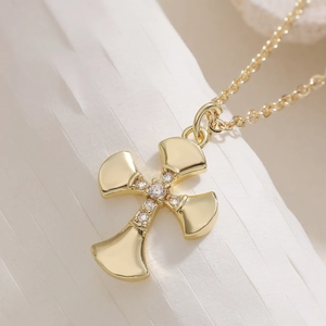 Minimalist 18K gold plated cross necklace with sparkling zircon stones for women
