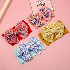 Set of four nylon baby headbands with large bows and floral leopard prints