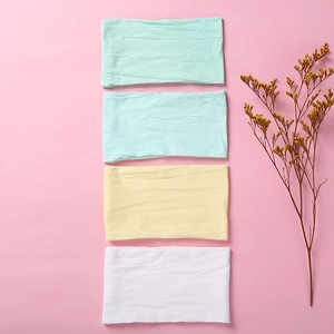 Soft nylon baby headbands in four macaron colors shown with dried floral decor